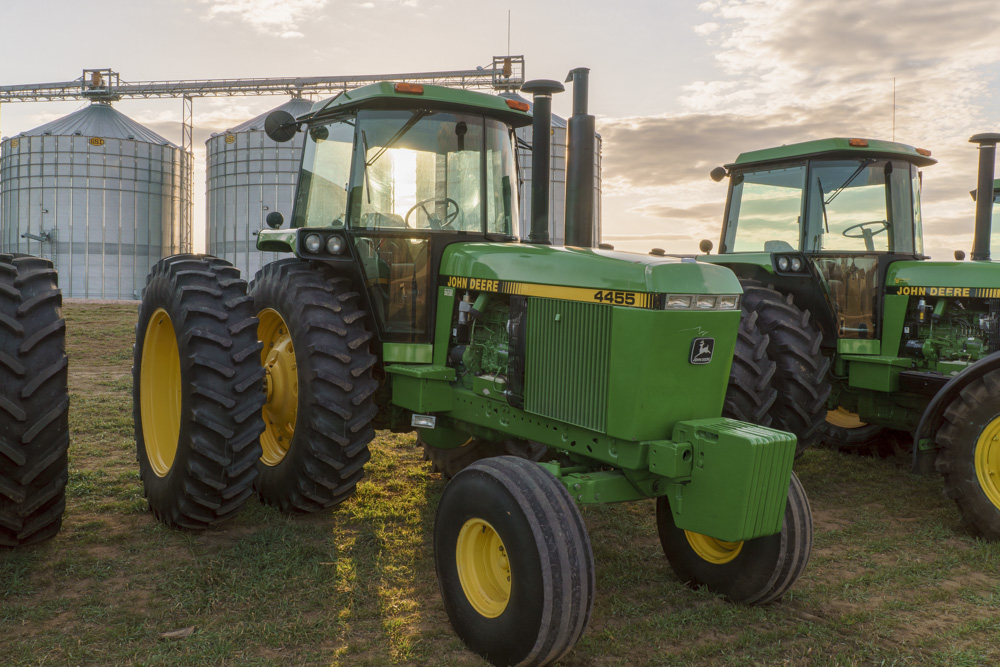 55-Series: John Deere 4455 tractor at sunset