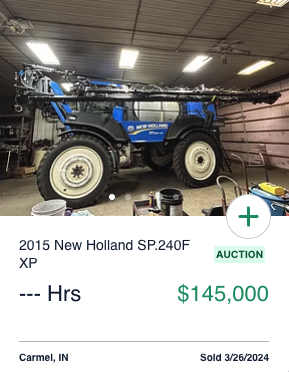 2015 New Holland SP.240F XP, blue sprayer in a garage