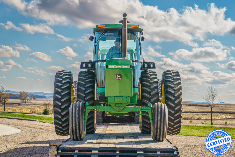 John Deere 4455 tractor with duals.